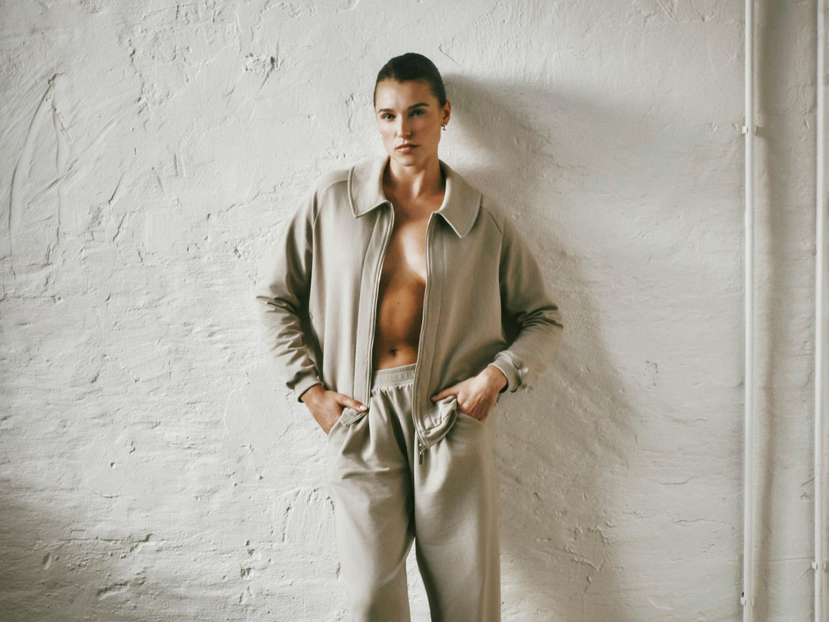 HANRO luxury loungewear jacket and trousers in taupe French terry cotton, styled for relaxed everyday layering